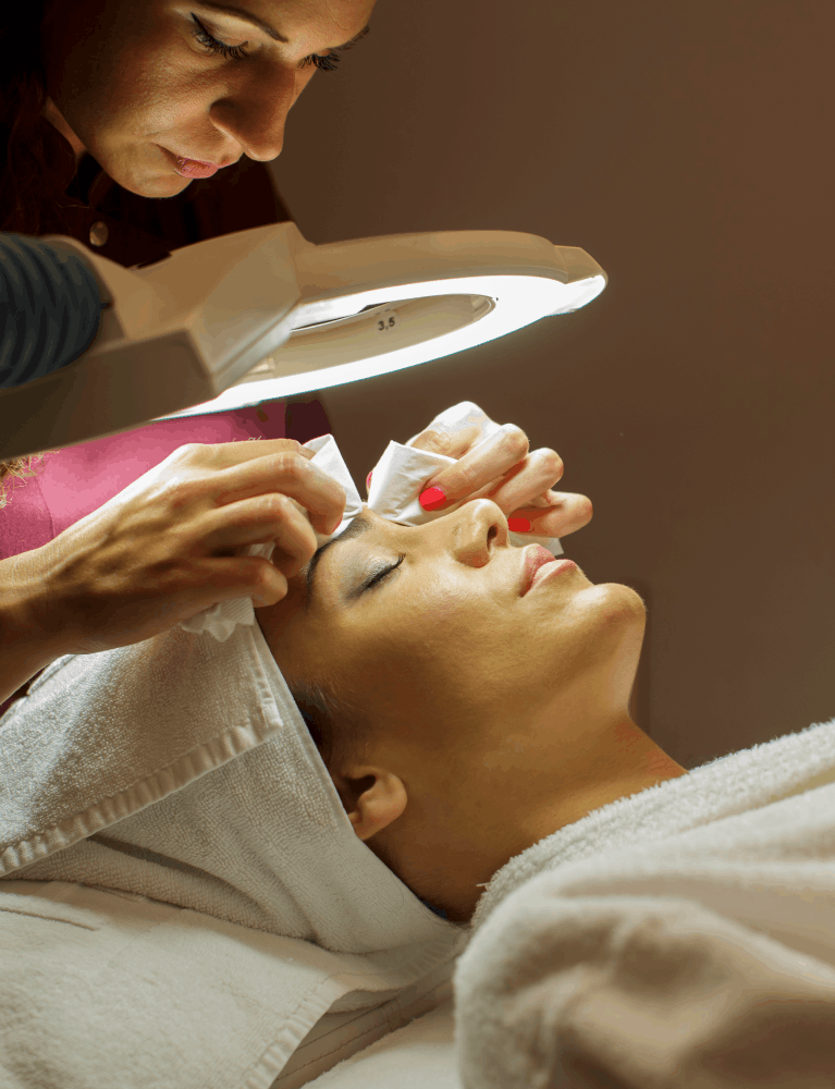 Dermatologist providing bridal skin preparation treatment to a bride-to-be at a skin clinic in Chennai.