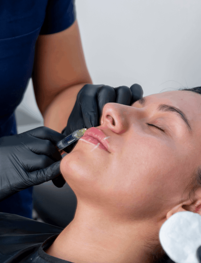 Dermatologist performing lip neutralization treatment to correct dark lip pigmentation at a skin clinic in Chennai.