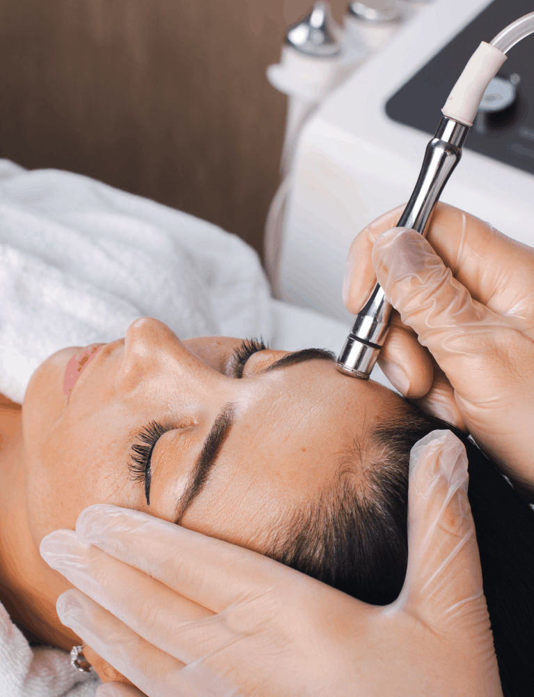 Dermatologist performing an Epiglow Signature Facial on a patient at a skin clinic in Chennai.