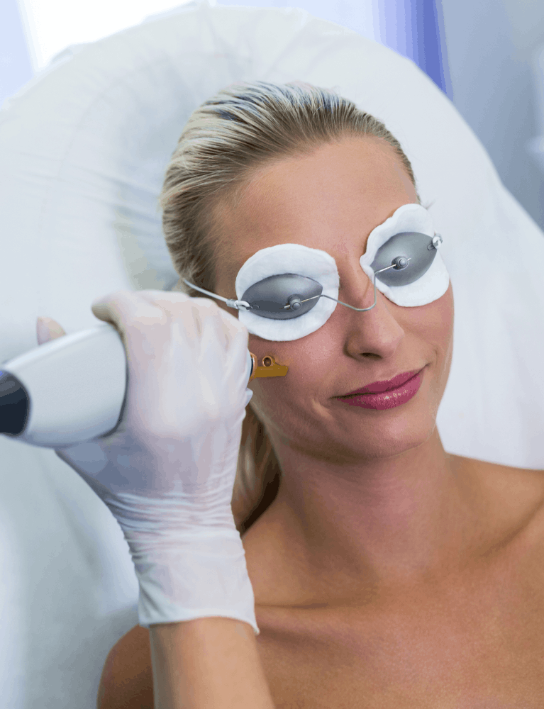 Dermatologist performing laser pigmentation treatment on a patient with facial pigmentation at a skin clinic in Chennai.