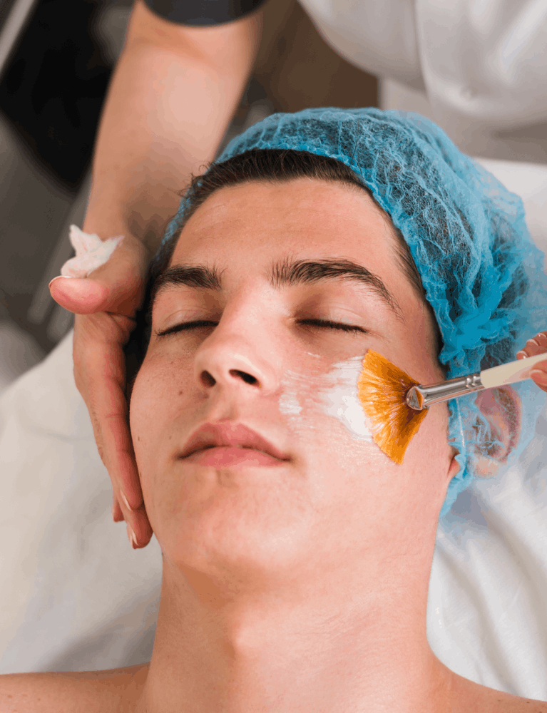 Dermatologist performing a skin brightening peel treatment on a patient at a skin clinic in Chennai.
